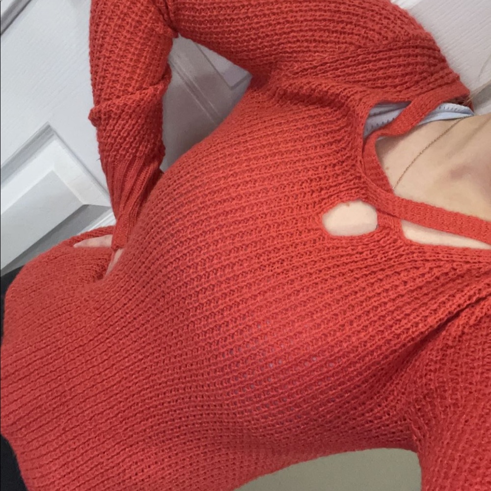 Orange/red sweater